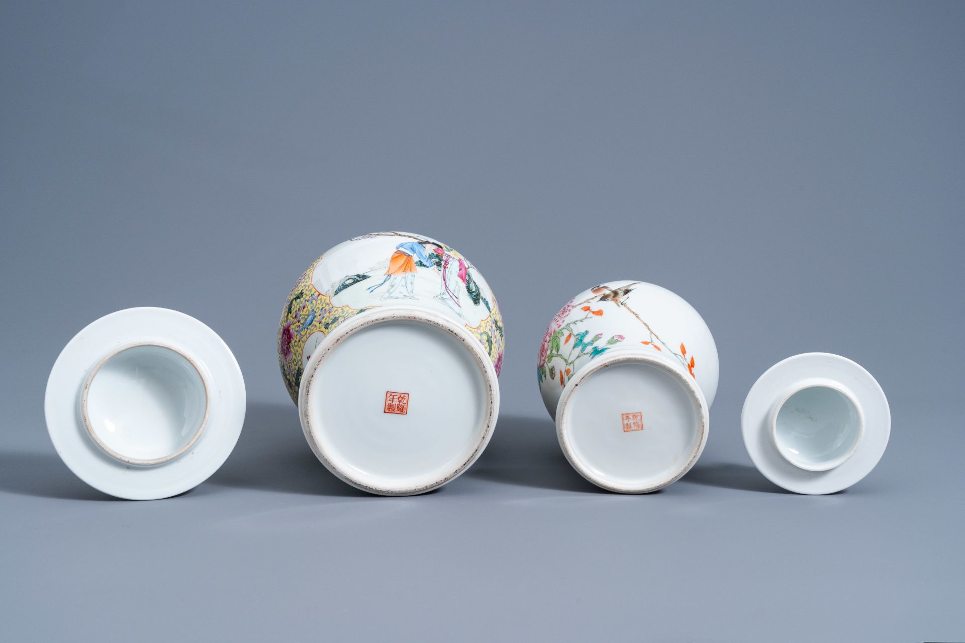 Two Chinese famille rose vases and covers and a plate with figures in a garden, Republic, 20th C. - Image 9 of 9