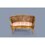 A French gilt wood Louis XV style cannage canapŽ en corbeille, 19th/20th C.