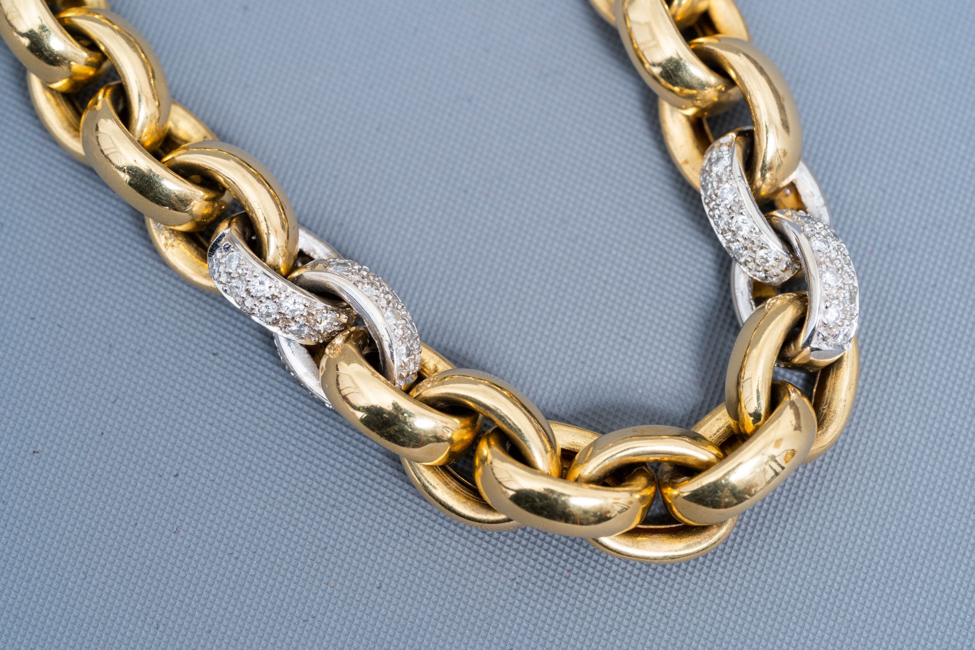 An 18 carat yellow and white gold bracelet set with 108 diamonds, 20th C. - Image 5 of 5