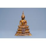 A Thai gilt bronze figure of Buddha Maravijaya on a lotus throne, Rattanakosin, 19th C.