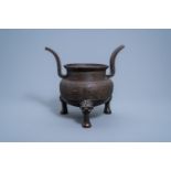 A large Chinese bronze tripod censer, Qing