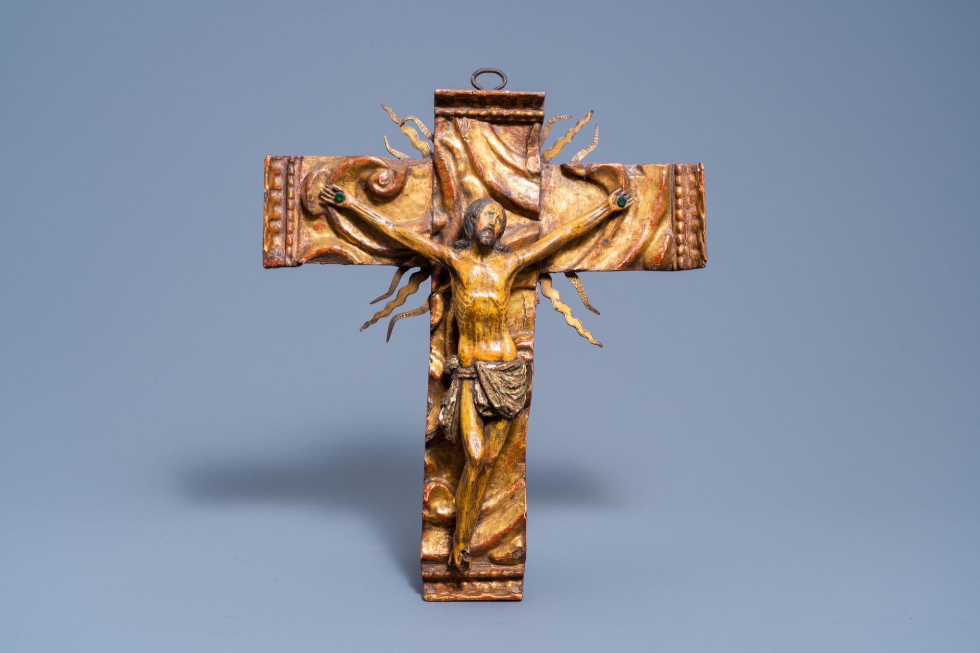 A Mexican colonial school carved and polychrome painted wooden crucifix, 17th C.