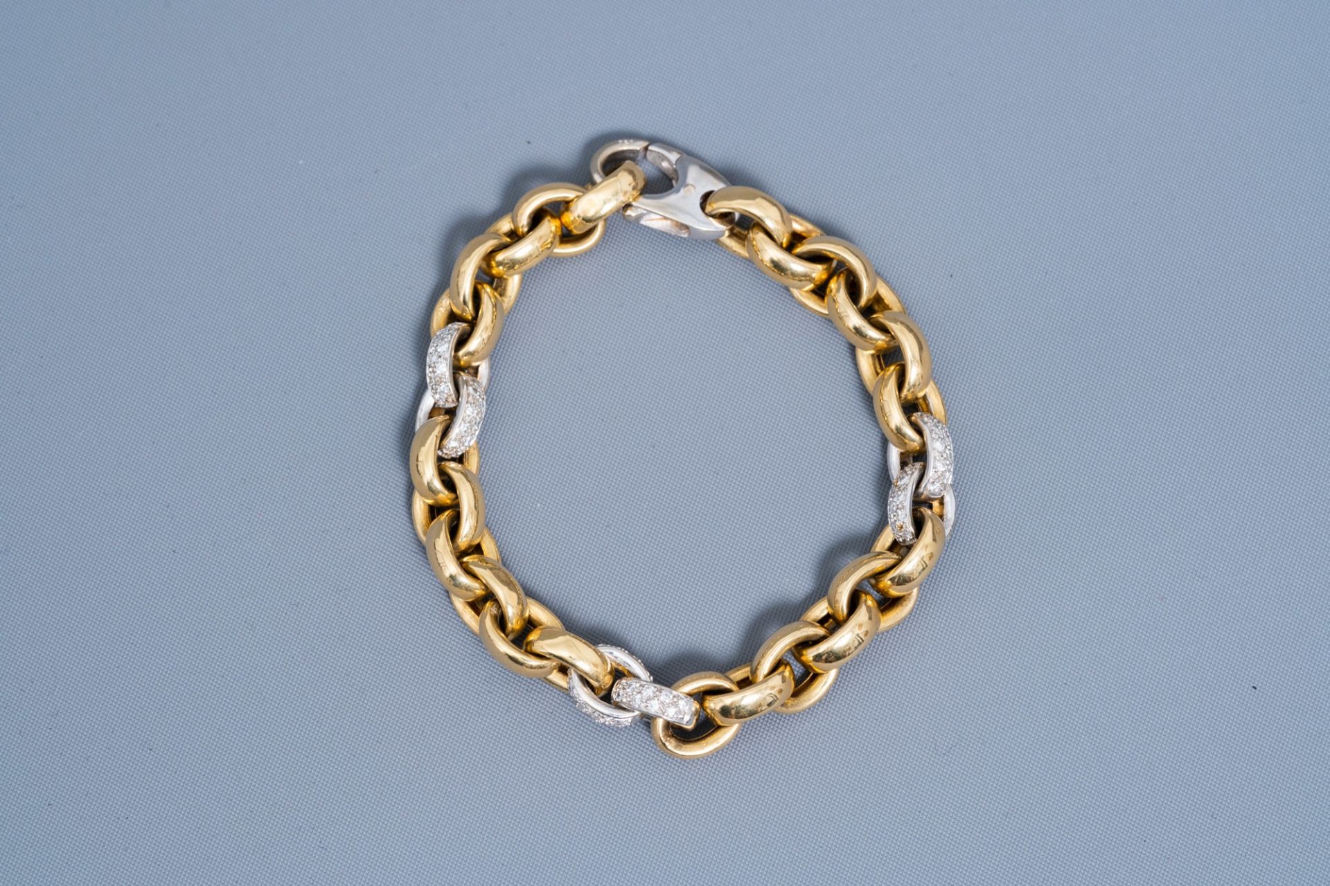 An 18 carat yellow and white gold bracelet set with 108 diamonds, 20th C.