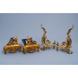 Two pairs of French Louis XV and XVI style gilt bronze and brass chenets, 19th/20th C.