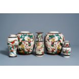 Three Chinese Nanking crackle glazed famille rose vases and a pair of ginger jars with warrior scene