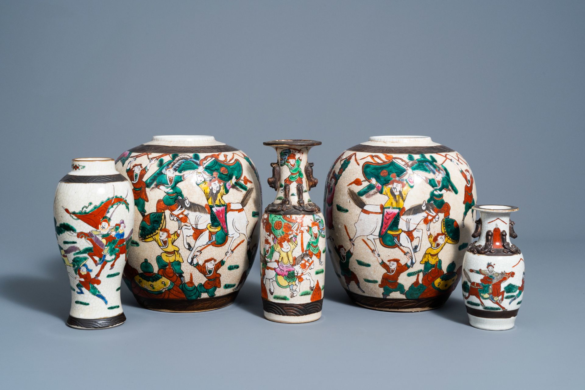 Three Chinese Nanking crackle glazed famille rose vases and a pair of ginger jars with warrior scene