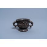 A Chinese bronze censer on foot, Xuande mark, 19th C.