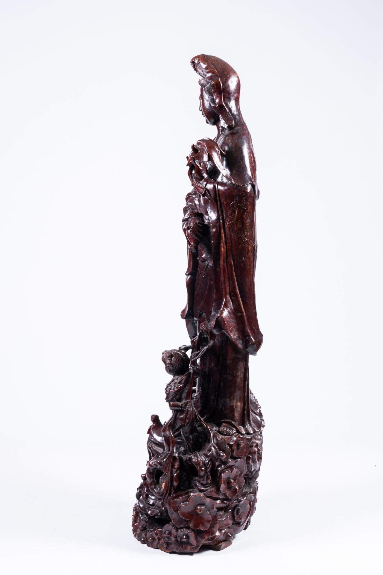 A massive Chinese carved wood group with a Guanyin, children and a dragon, 20th C. - Image 6 of 14