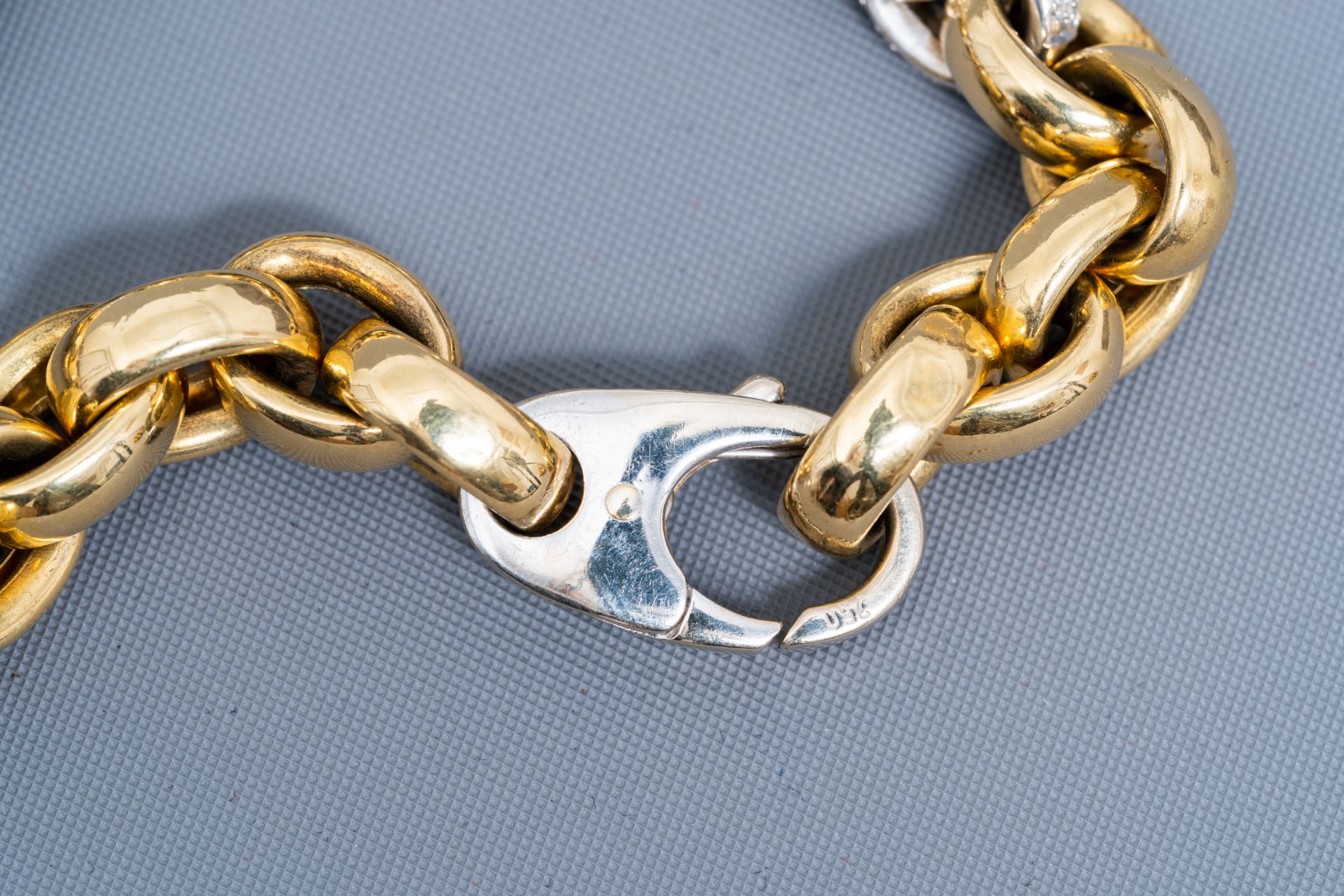 An 18 carat yellow and white gold bracelet set with 108 diamonds, 20th C. - Image 3 of 5