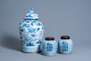 Two Chinese blue and white 'Xi' jars and covers and a 'dragons chasing the pearl' vase and cover, 19