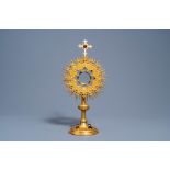 A Belgian Gothic Revival gilt brass sun-shaped monstrance set with cabochons, marked 'Dehin Frres ˆ