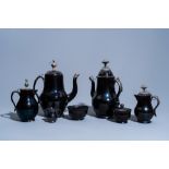 Five various black glazed Namur pottery jugs and two bowls, some pieces silver mounted, 18th C.