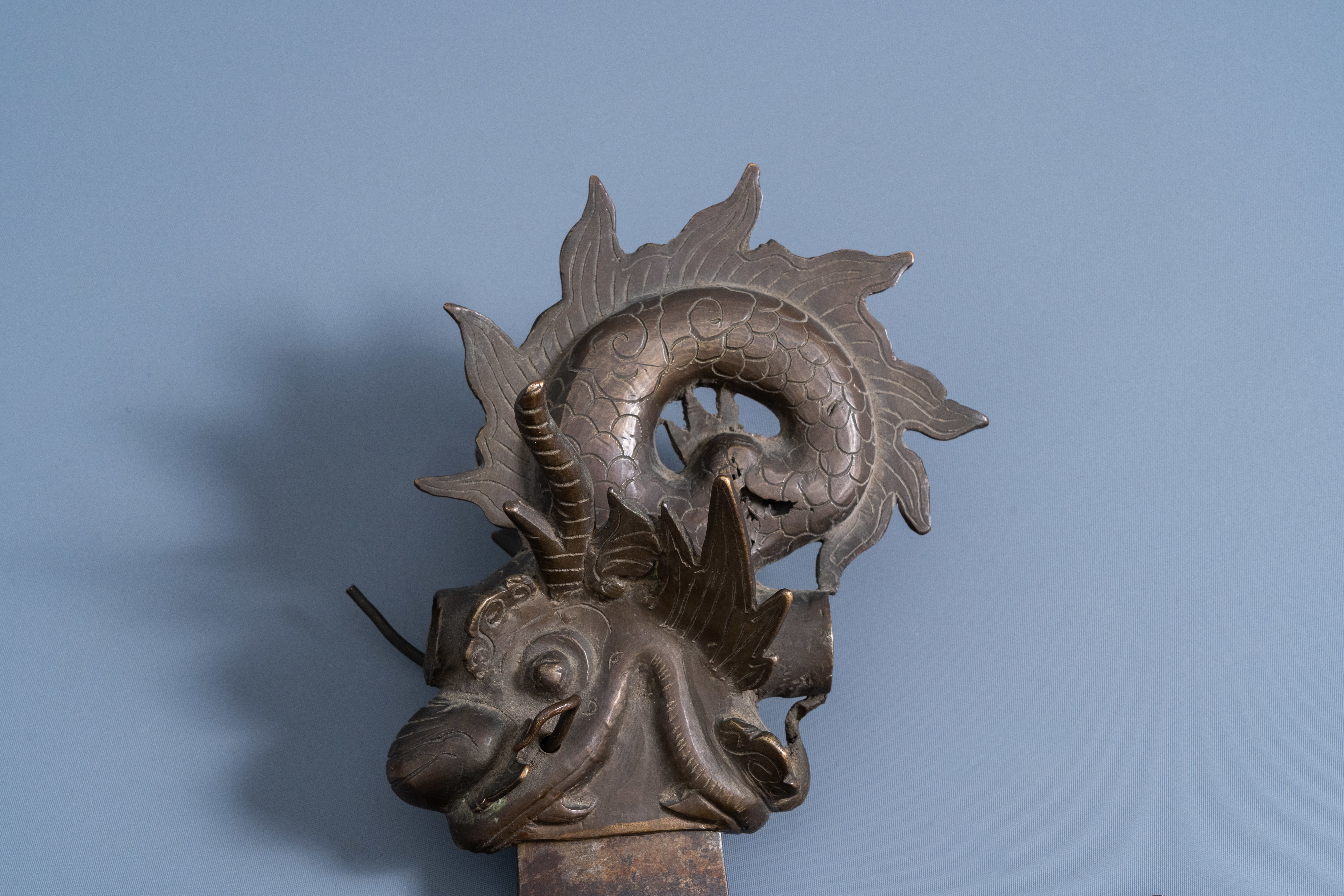 A Tibetan bronze and iron ceremonial axe or kartika with engraved design, 19th/20th C. - Image 3 of 8