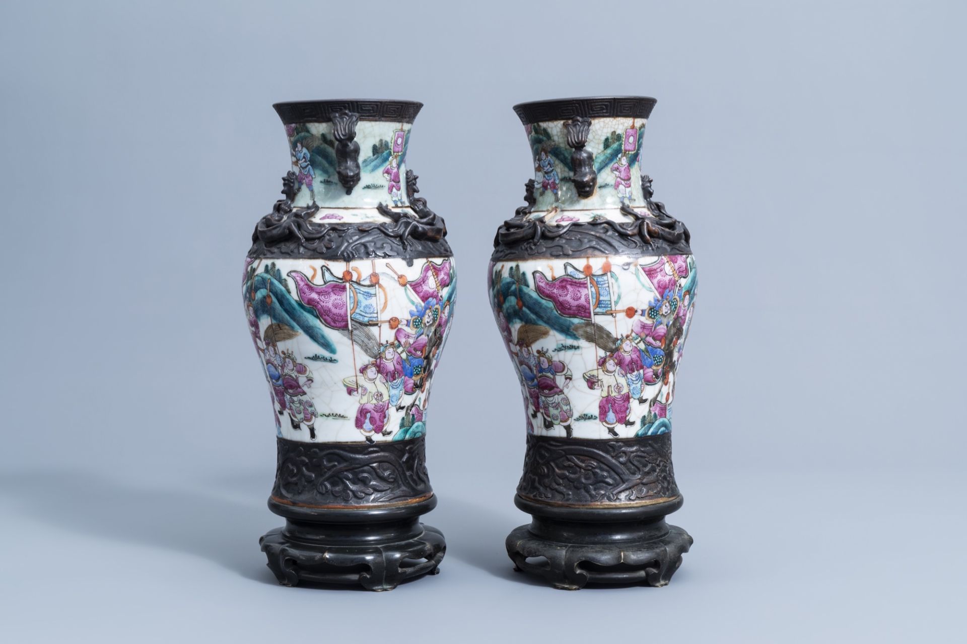 A pair of Chinese Nanking crackle glazed famille rose vases with warrior scenes on bronze lotus shap - Image 2 of 11