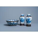 Two Chinese Nanking crackle glazed blue and white 'warrior' vases and a 'landscape' bowl, 19th/20th