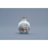 A Chinese famille rose snuff bottle with figures and animals in a garden, Daoguang mark and of the p