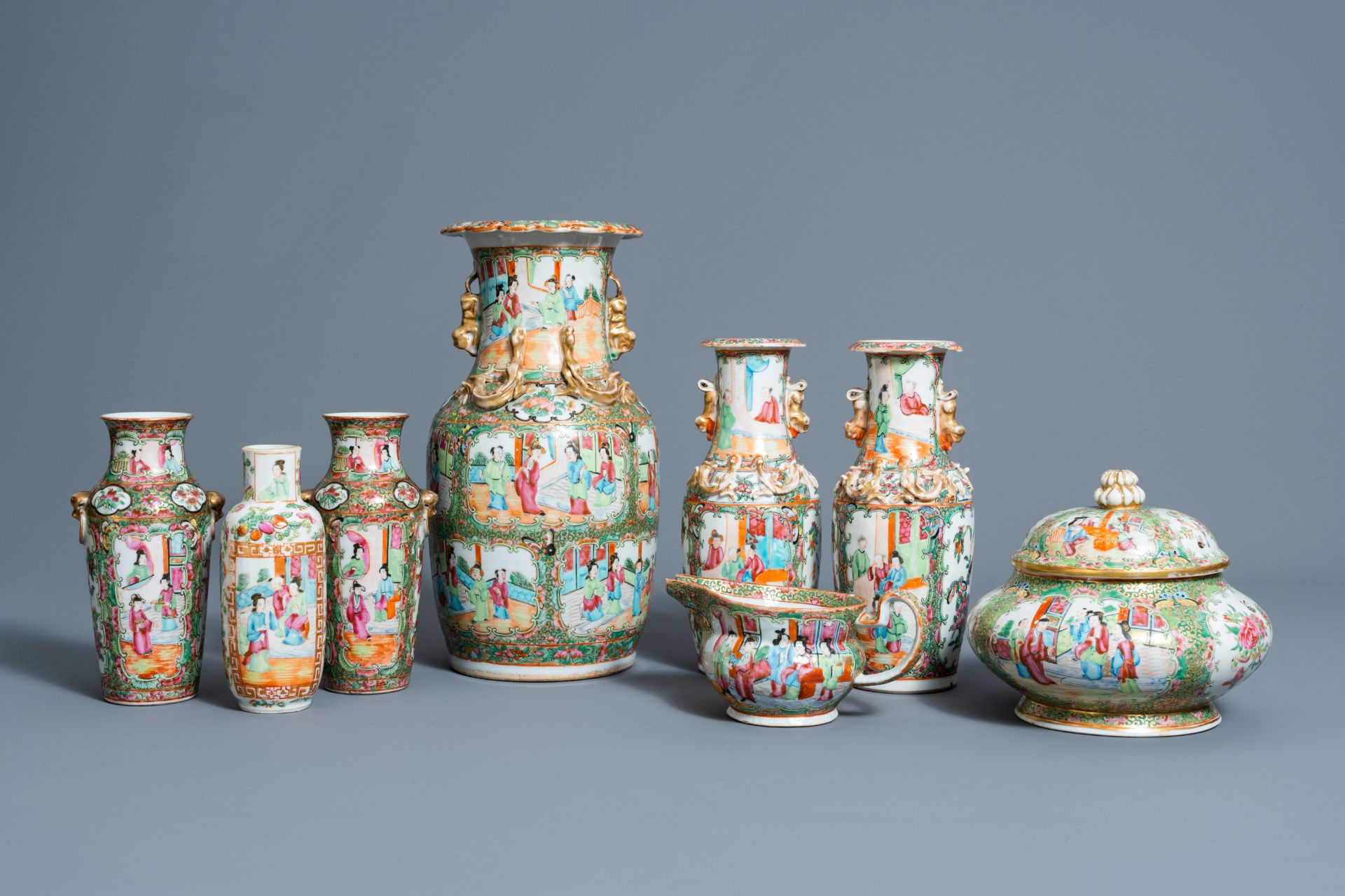 Six Chinese Canton famille rose vases, a jar and cover and a cream jug, 19th C.