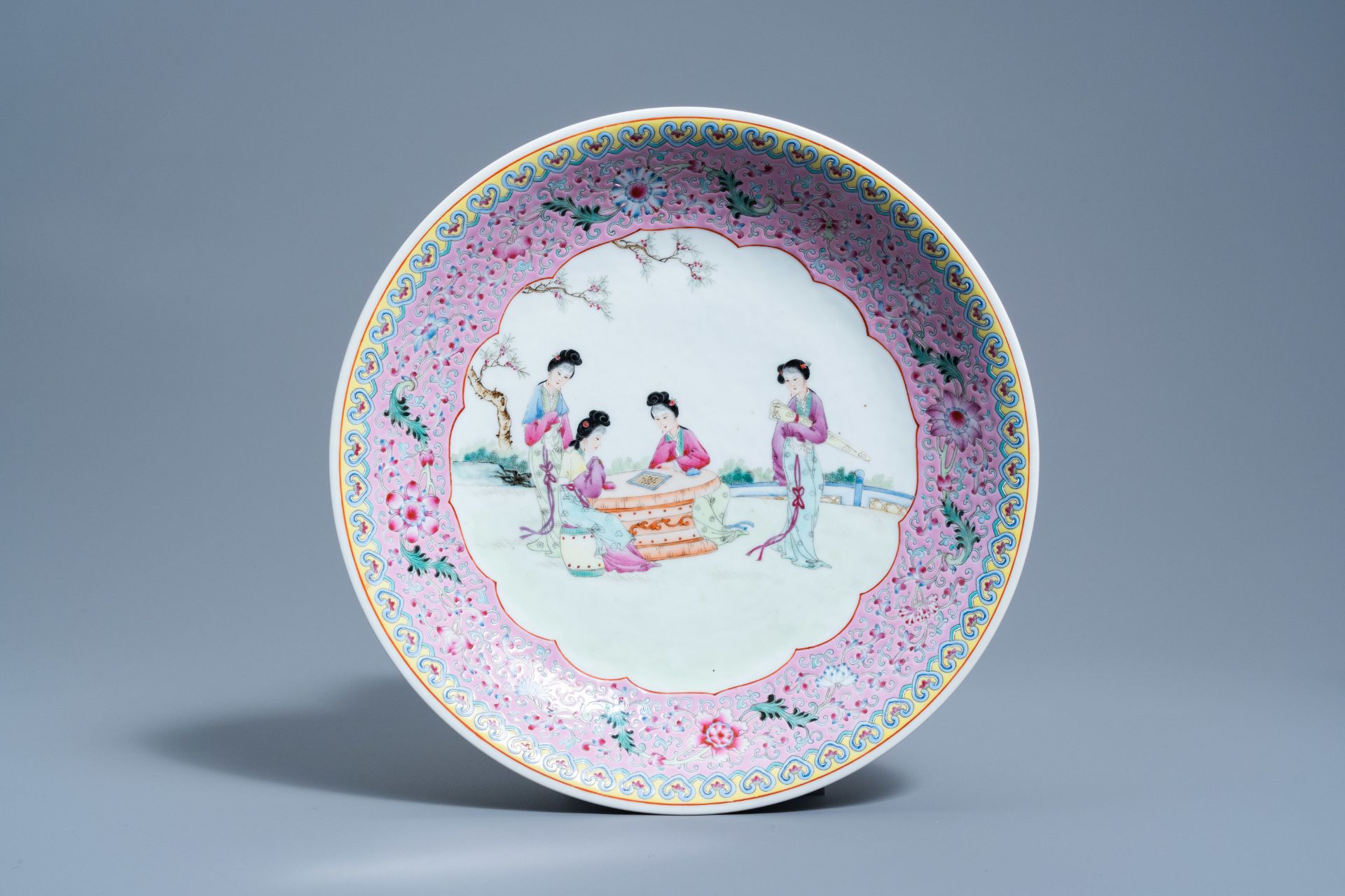 A pair of Chinese famille rose bottle vases with floral design and a charger with ladies in a garden - Image 2 of 9