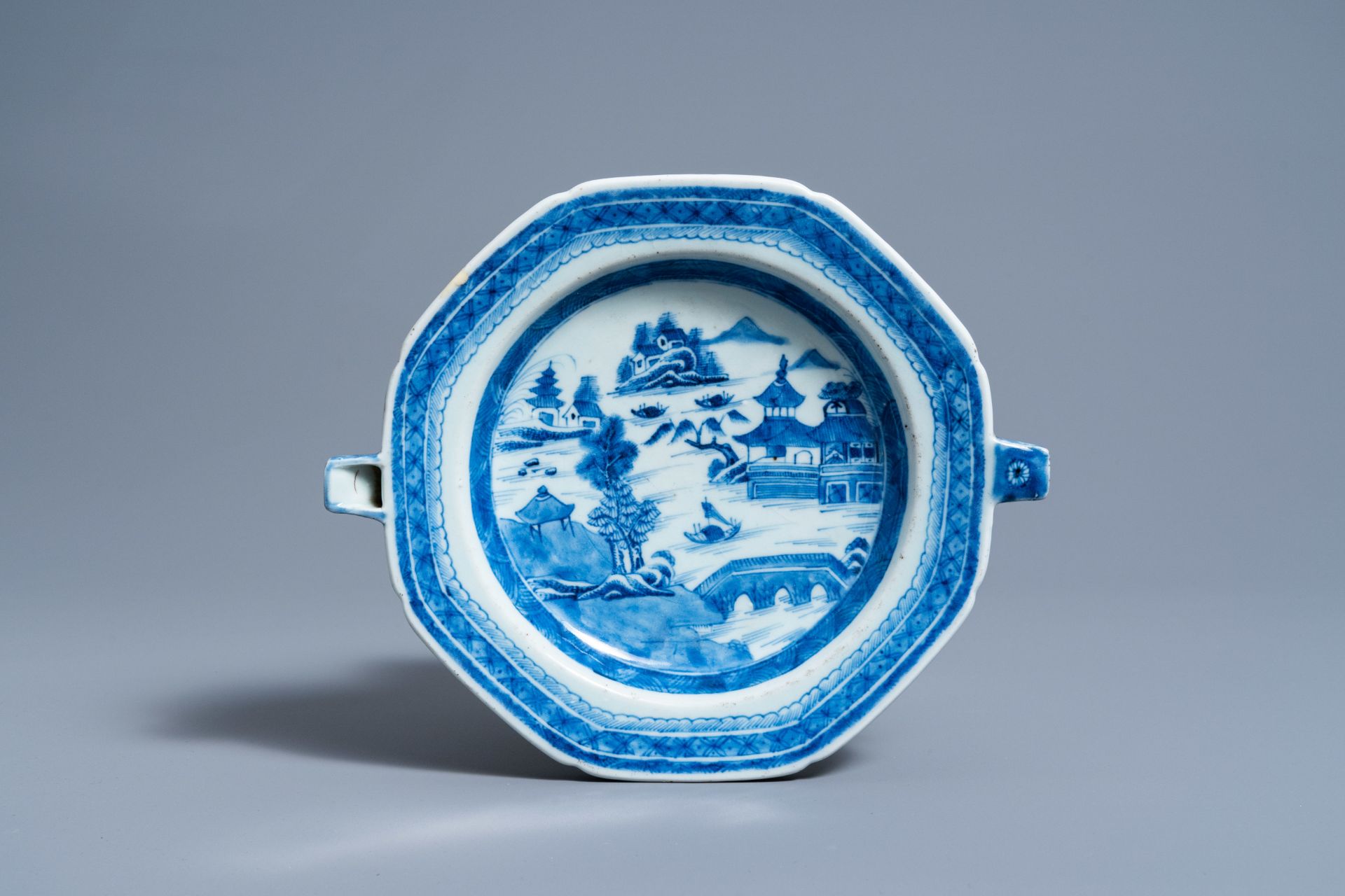 A Chinese blue and white warming plate with a river landscape, Jiaqing