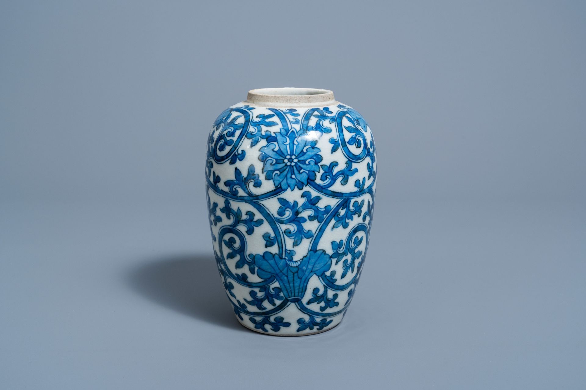 A Chinese blue and white 'lotus scrolls' jar, 19th C.