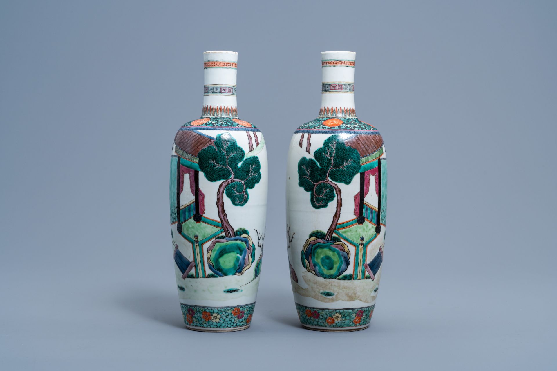 A pair of Chinese bottle shaped famille verte vases with figures in a landscape, 19th C. - Image 2 of 6