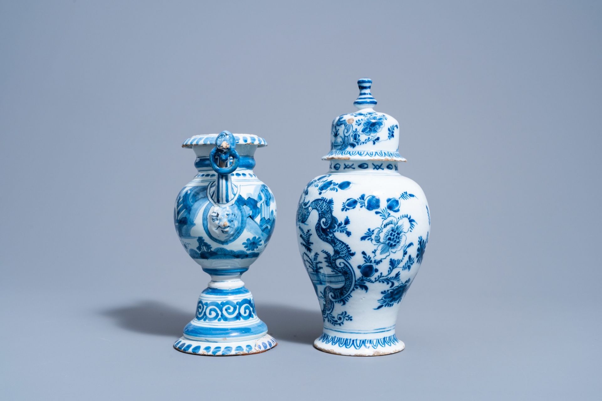 A Dutch Delft blue and white gadrooned dish with a boat and two vases with figures in a garden, 17th - Image 5 of 9