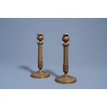 A pair of French bronze candlesticks with floral design, 19th C.