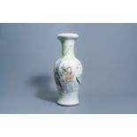 A Chinese qianjiang cai 'Hua Mulan' baluster vase, 19th/20th C.