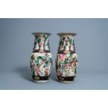 Two Chinese Nanking crackle glazed famille rose vases with warrior scenes, 19th/20th C.