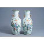 A pair of Chinese famille rose vases with a qilin and figures in a garden, 19th/20th C.