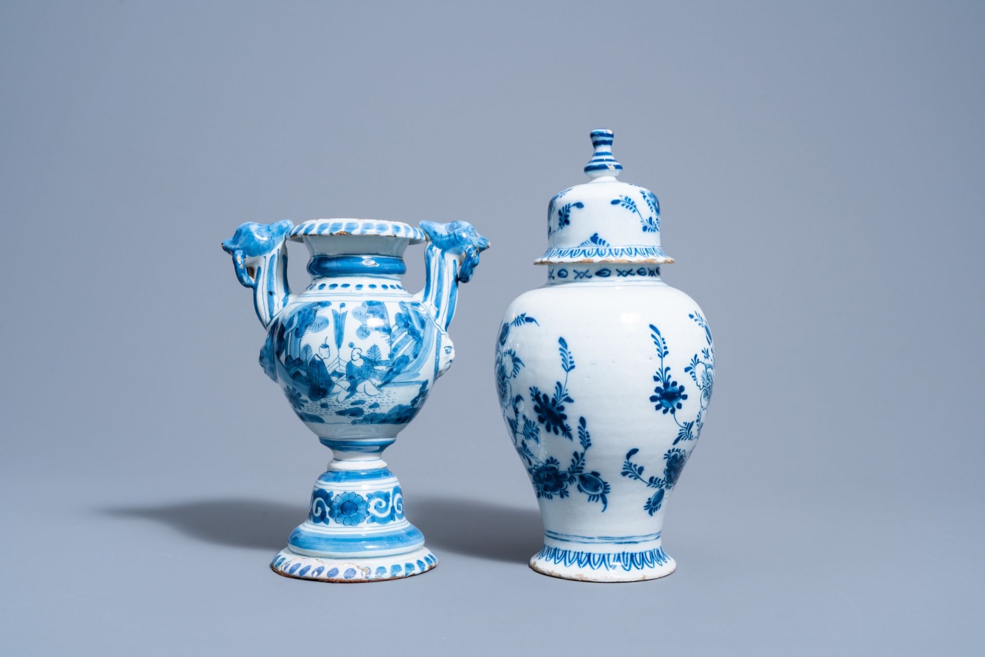 A Dutch Delft blue and white gadrooned dish with a boat and two vases with figures in a garden, 17th - Image 6 of 9