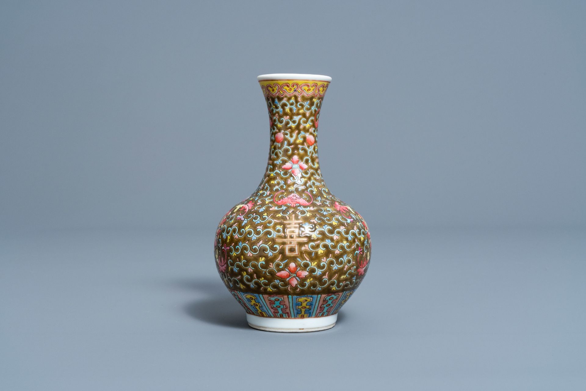 A Chinese famille rose brown ground vase with floral design, 'Happiness' mark, Republic, 20th C.