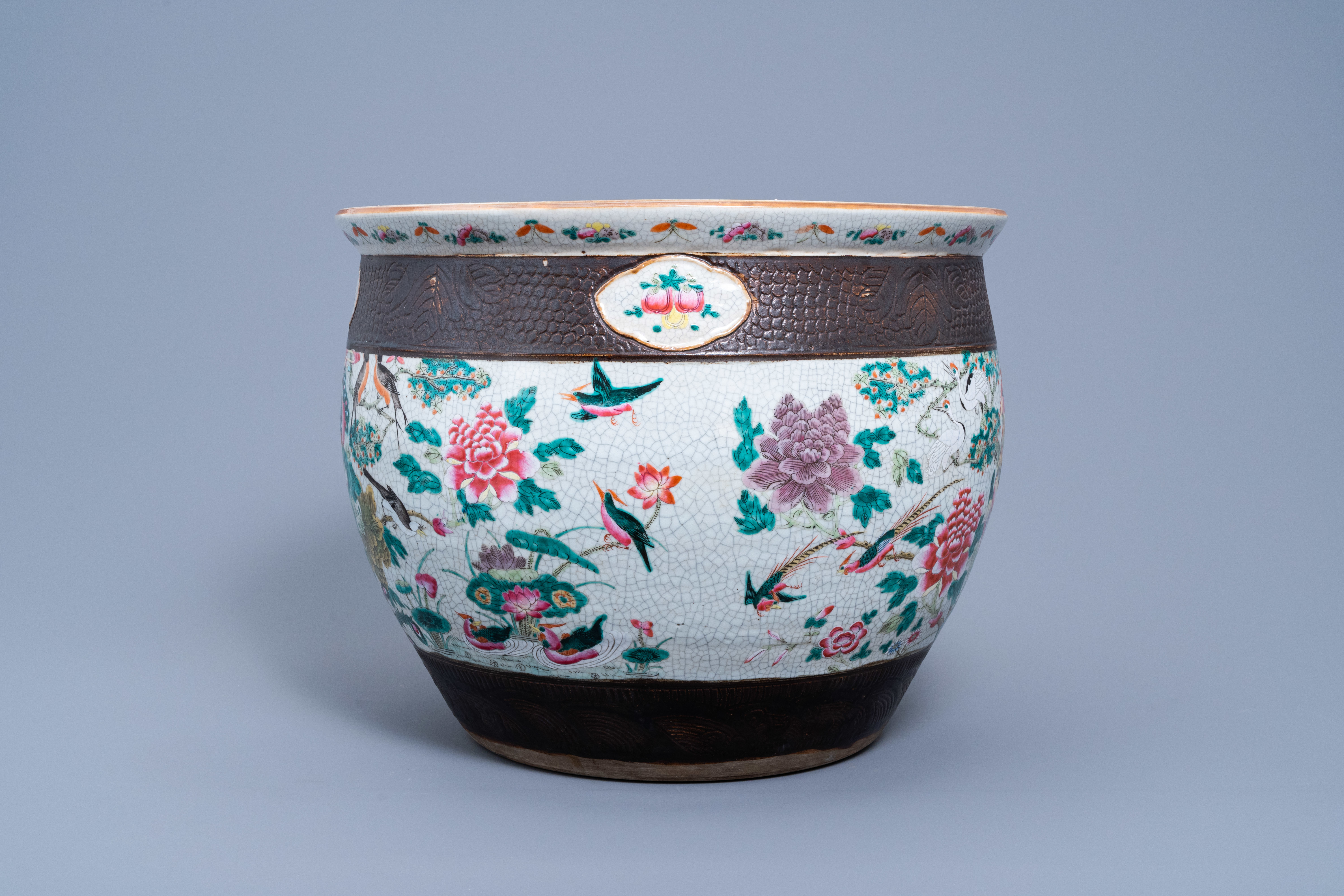 A Chinese Nanking crackle glazed famille rose jardinire with birds among blossoming branches, 19th - Image 5 of 10