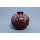 A Japanese brown patinated bronze Art Deco vase with fish relief design, Showa, 20th C.