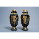 A pair of Art Deco gilt bronze mounted vert de mer marble cassolettes, first half of the 20th C.