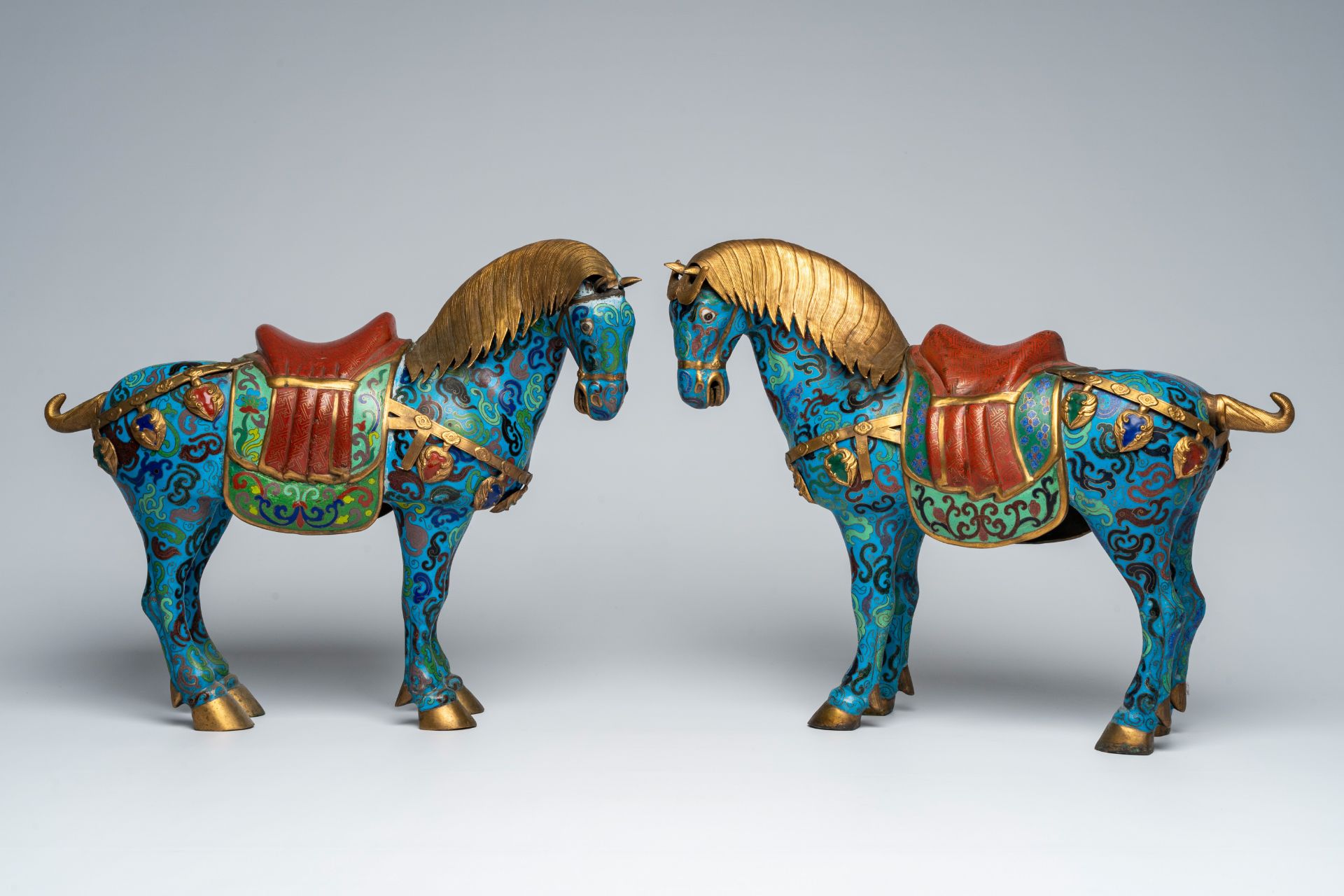 A pair of Chinese cloisonnÃ© horses, 20th C.