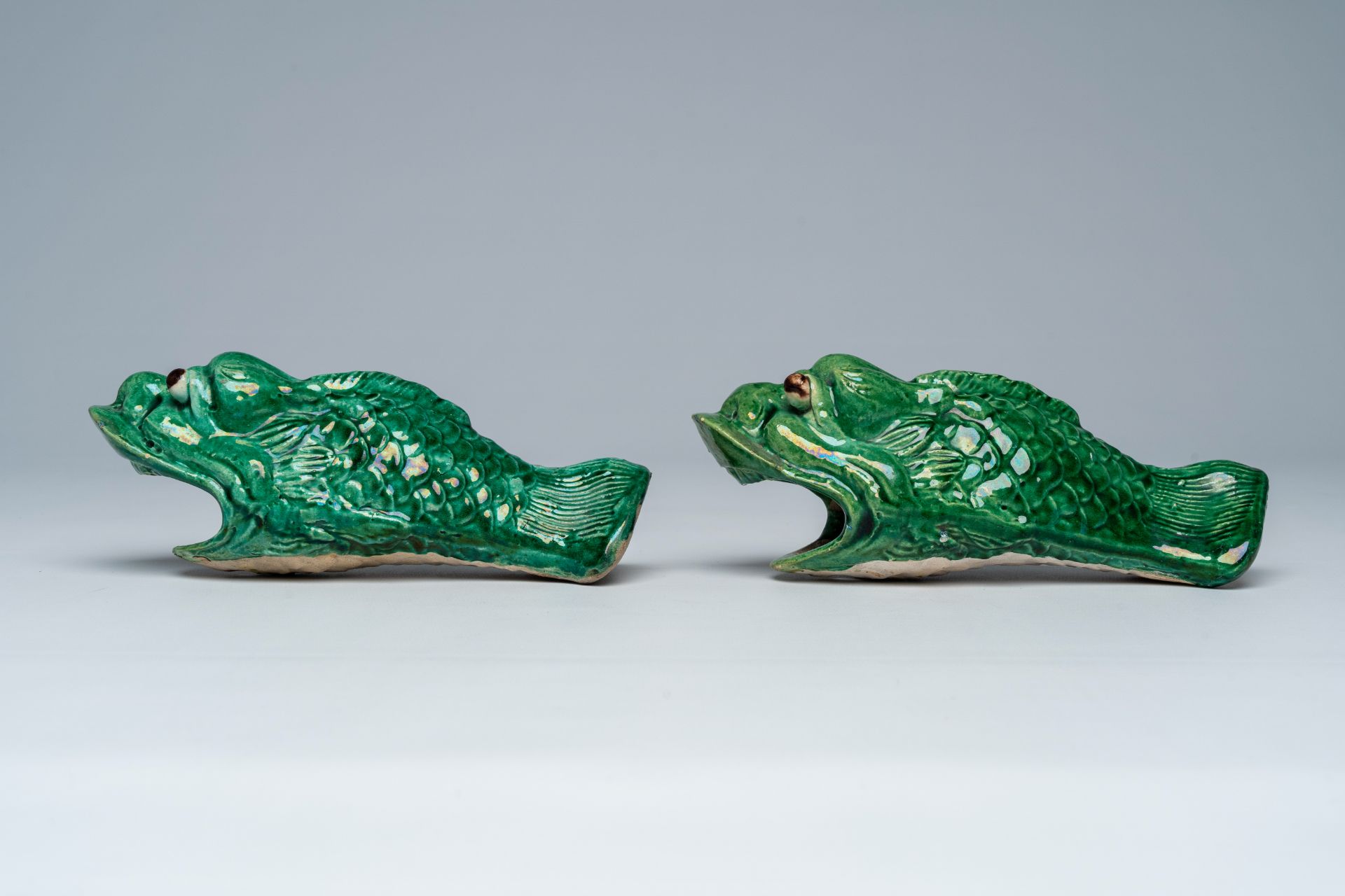 A pair of Chinese green glazed earthenware 'carp' wall vases, ca. 1900 - Image 4 of 7