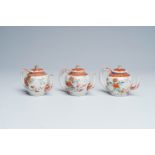 Three Japanese Kakiemon style teapots and covers with floral design, Edo, late 17th C.