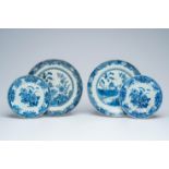 A pair of Chinese blue and white 'landscape' chargers and a pair of blue and white dishes with flora