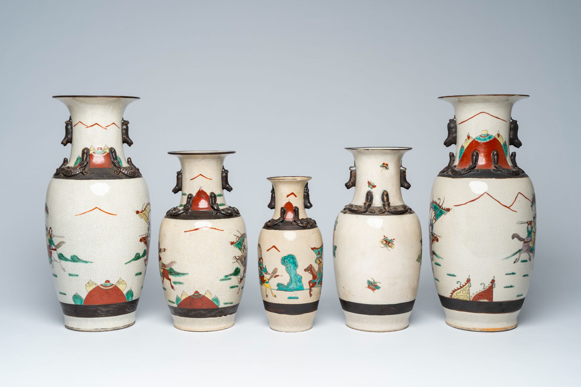 A varied collection of ten Chinese Nanking crackle glazed famille verte vases with warrior scenes an - Image 10 of 13