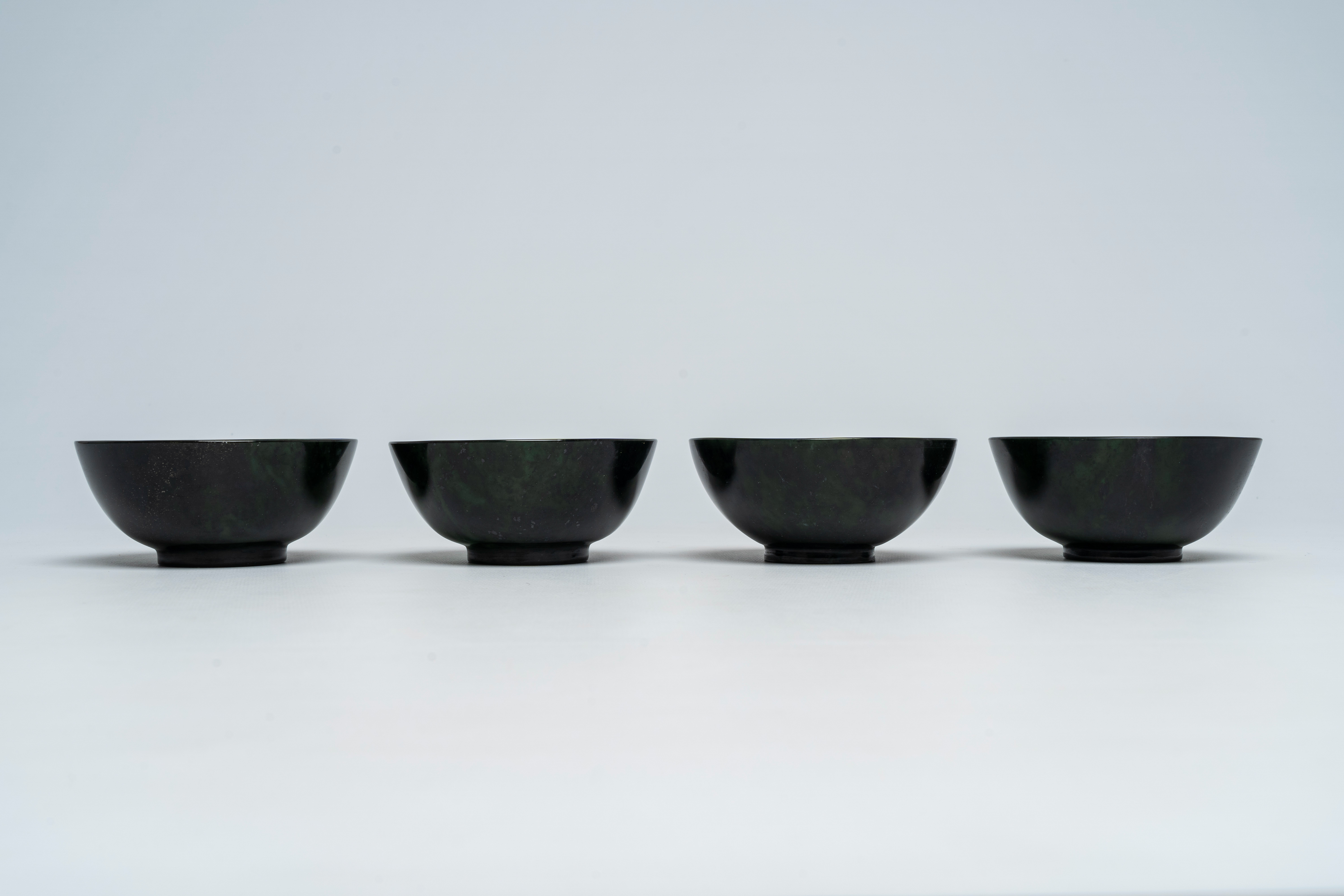 Four Chinese dark green jade bowls, 19th/20th C. - Image 4 of 8