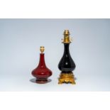 A Chinese monochrome red vase mounted as a lamp and a gilt bronze mounted black glass vase, 19th/20t