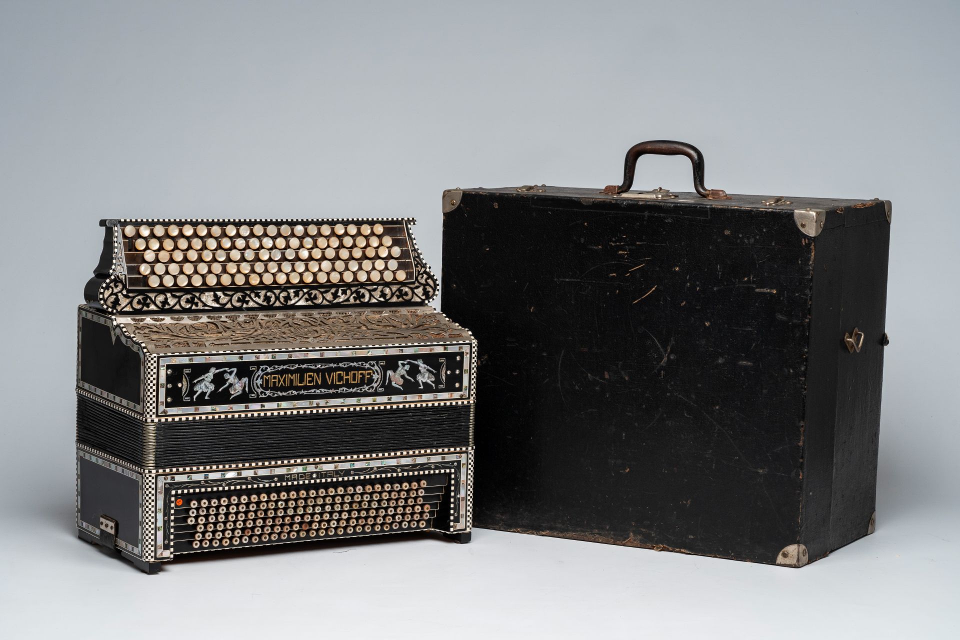 An Italian 'Maximilien Vichoff' chromatic accordion with button keyboard and box, ca. 1930