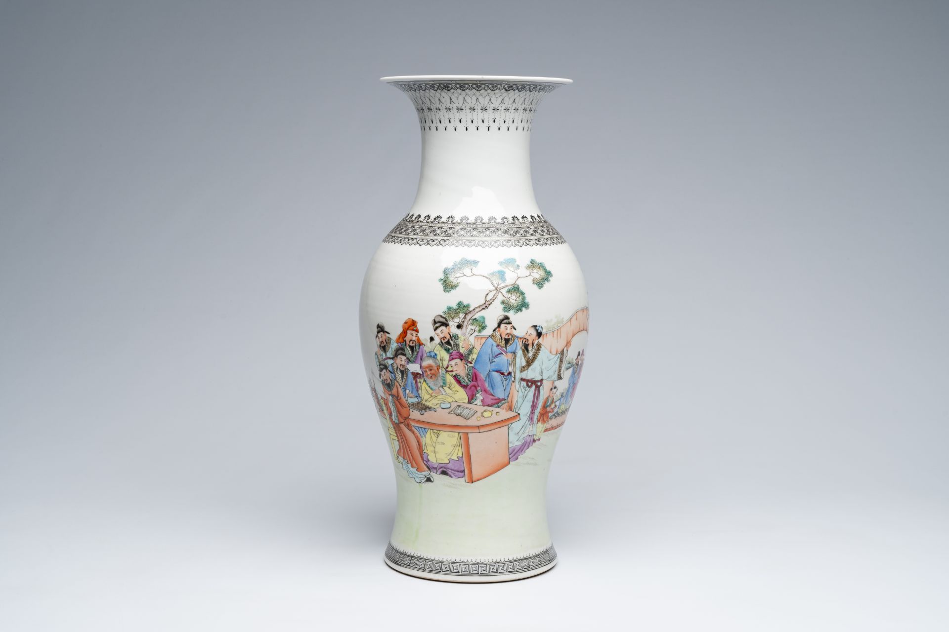 A Chinese baluster shaped famille rose vase with Immortals in a garden, Republic, 20th C.