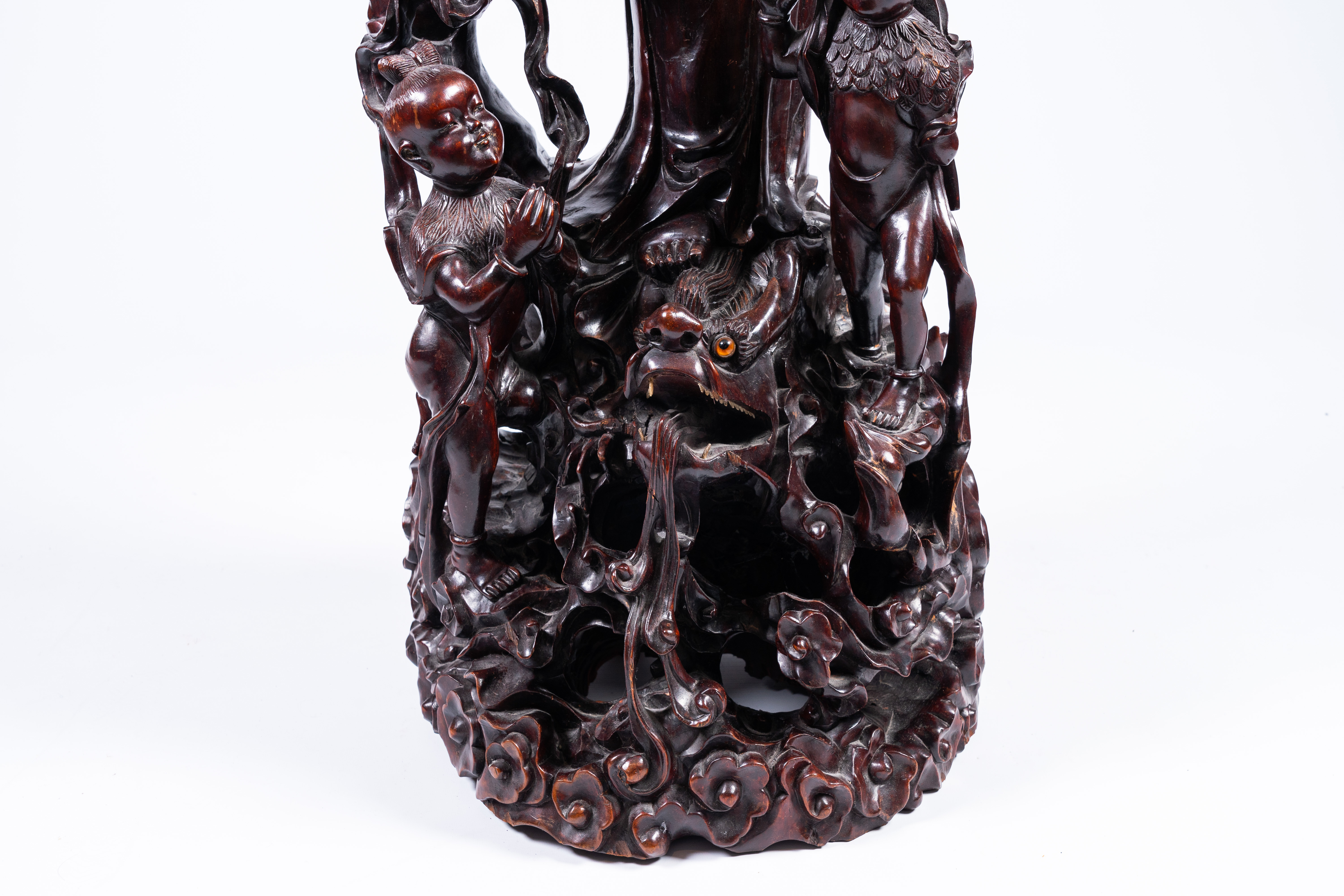 A massive Chinese carved wood group with a Guanyin, children and a dragon, 20th C. - Image 12 of 17