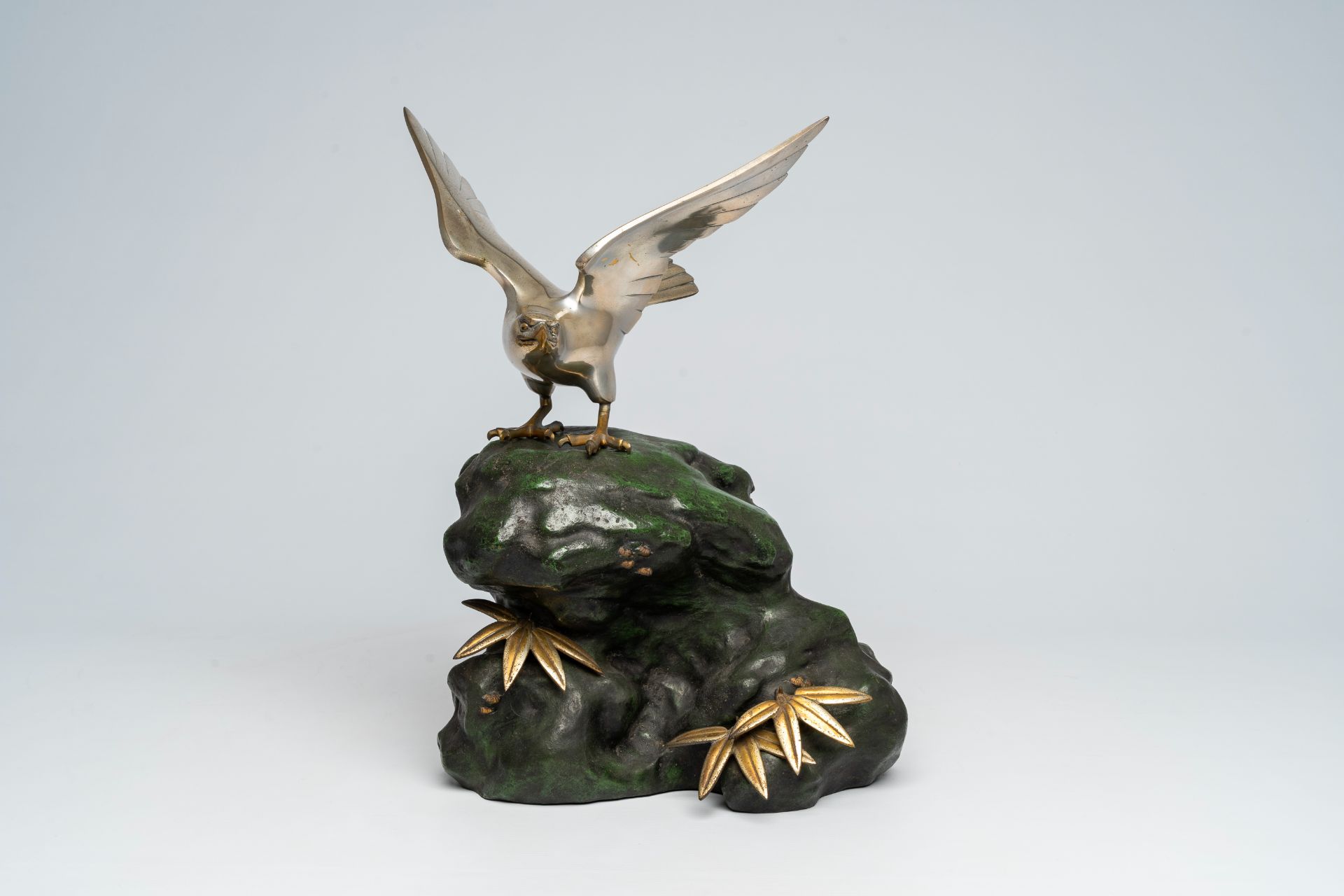 A Japanese patinated and silver-plated metal okimono of an eagle on a rock, signed Hidemasa, 20th C. - Image 10 of 17