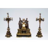 A monumental French gilt and patinated bronze and black marble three-piece clock garniture with Lady