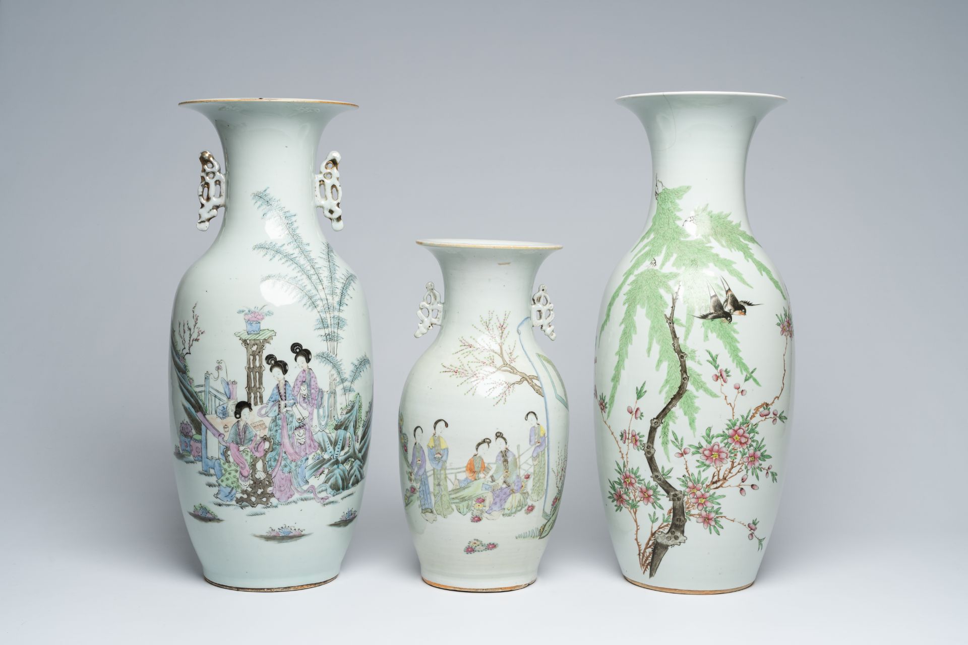 Three Chinese qianjiang cai vases with ladies in a garden and birds among blossoming branches, 19th/