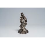 A presumably Spanish silver crowned Virgin Mary standing on three cherub heads and an octagonal base