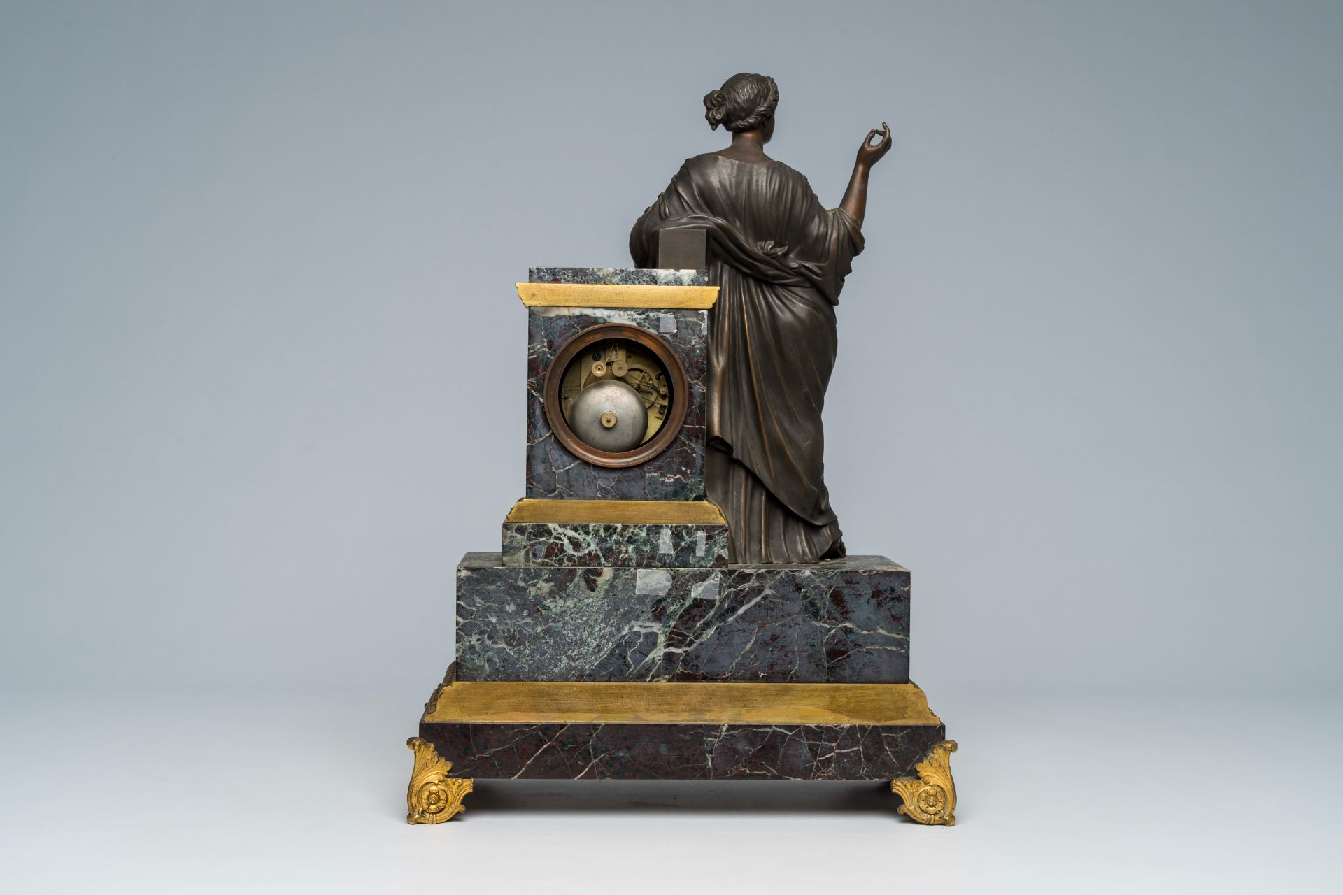 A French gilt and patinated bronze mounted marble mantel clock with an elegant lady, 19th C. - Image 5 of 9